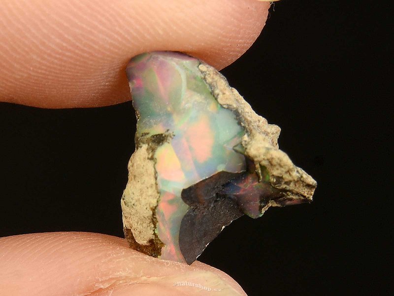 Expensive opal in the rock of Ethiopia (0.6g)