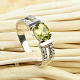 Ring olivine oval with zircons 8x6mm 925/1000 (3,8g) size61