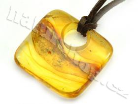 amber pendant on the skin