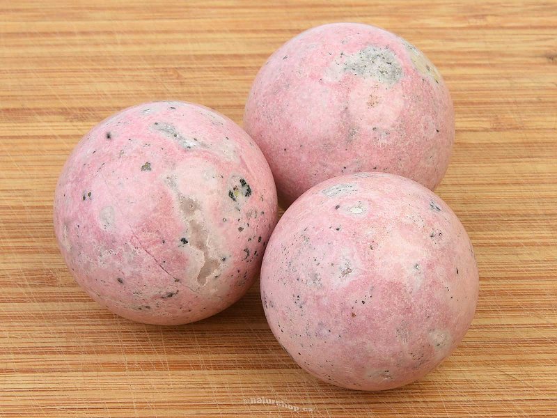 Pink rhodonite smooth sphere (Peru)