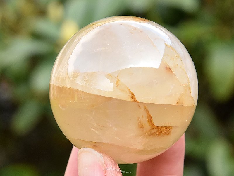 Crystal with limonite smooth ball 166g