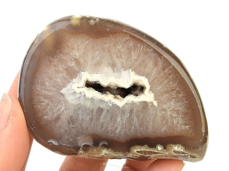 Brown-white agate geode with cavity 208 g
