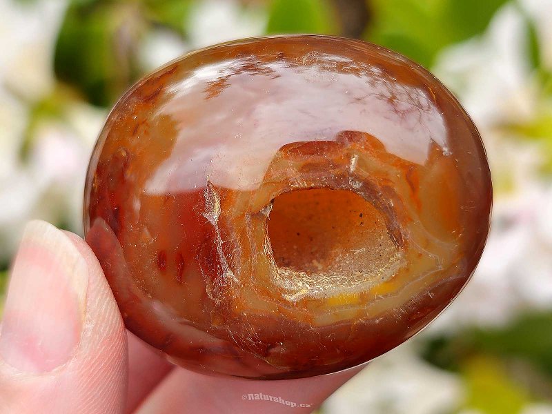 Carnelian smooth stone with cavity from Madagascar 69g