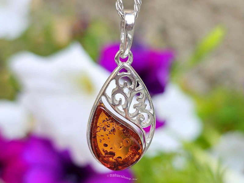 Amber honey drop pendant decorated with silver Ag 925/1000