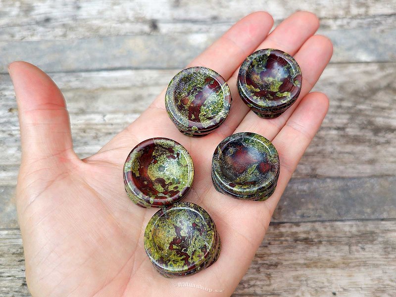 Dragon blood jasper stands on the ball