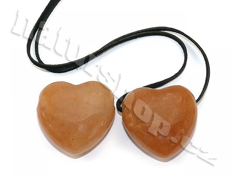 Calcite Orange bigger heart pendant on leather