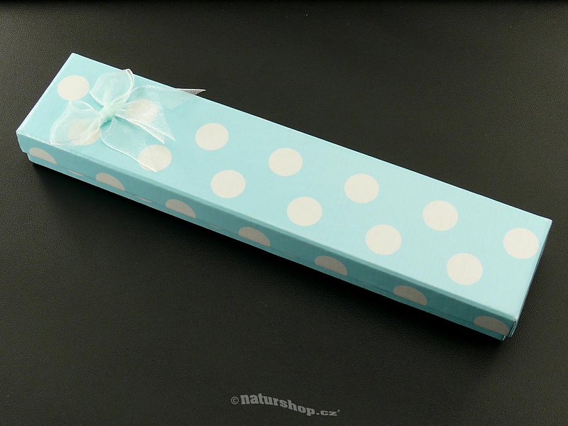 Gift box with blue polka dots and ribbon - the bracelet