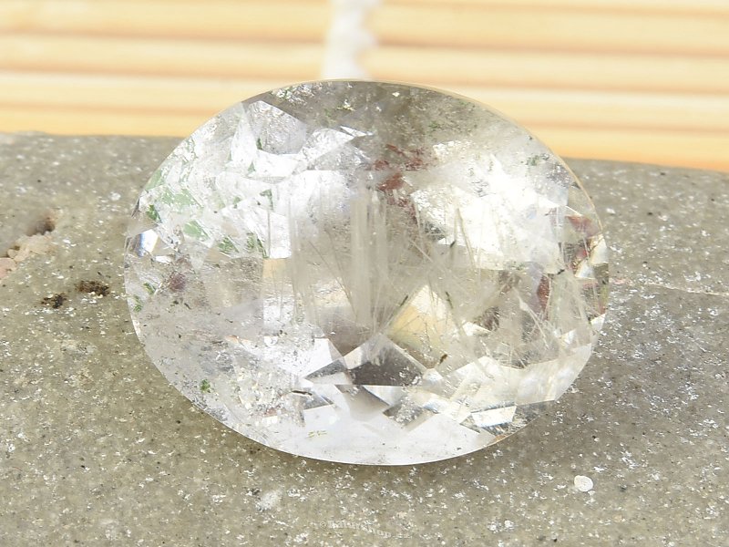 Crystal with inclusions oval brus 57.16ct