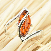 Elongated amber ring decorated with Ag 925/1000