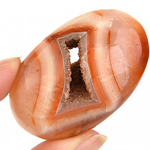 Smooth carnelian stone with cavity from Madagascar 63g