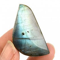 Labradorite in the shape of a muggle with colored reflections 13g