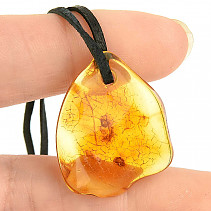Pendant with amber on black leather 2.2g
