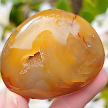 Carnelian smooth stone with cavity from Madagascar 88g