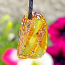 Pendant with amber on leather 2.2g