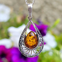 Amber honey pendant decorated with silver Ag 925/1000