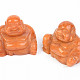 Calcite orange buddha carving