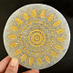 Selenite mat with a golden motif with leaves Ø12cm