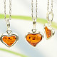 Heart pendant made of amber Ag 925/1000 (approx. 15mm)