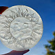 Selenite wheel with a sun motif approx. 7.5 cm