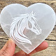 Selenite heart with engraved horse motif