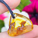 Pendant with amber on leather 2.5g