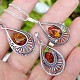 Amber honey pendant decorated with silver Ag 925/1000