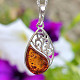 Amber honey drop pendant decorated with silver Ag 925/1000