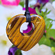 Tiger's eye pendant on leather heart 40mm