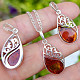 Amber honey drop pendant decorated with silver Ag 925/1000