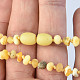 Milky opaque amber necklace pebbles 35 cm (children's size)